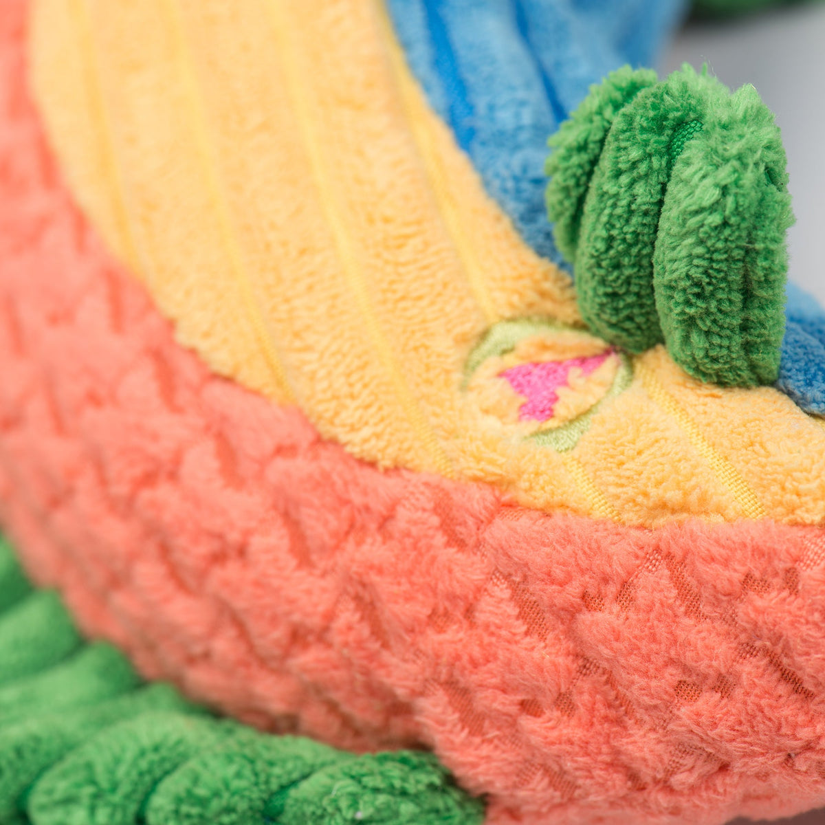 Raucous Rainbow Trout Knottie Plush Dog Toy, lifestyle