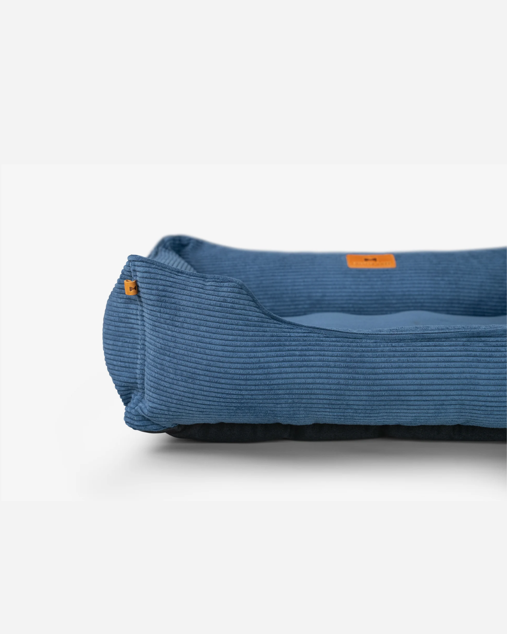 Spacious corduroy dog bed with washable removable cover