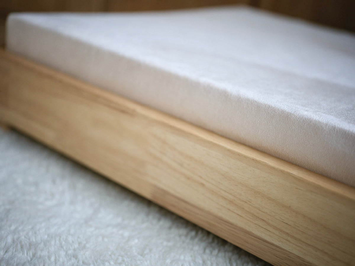 The Haven solid hardwood orthopedic dog bed with tailored upholstered cover