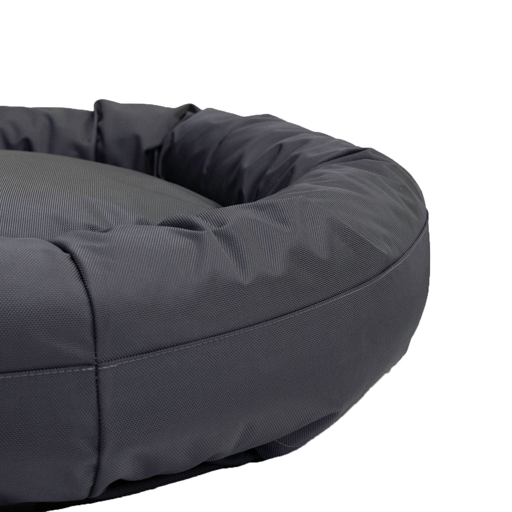 Armor bolster bed with calming nest-like walls