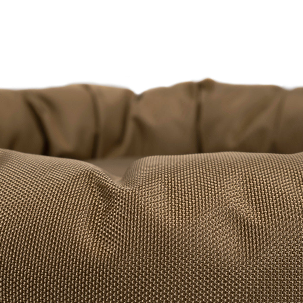 Armor round bolster dog bed in rugged 1680D ballistic fabric
