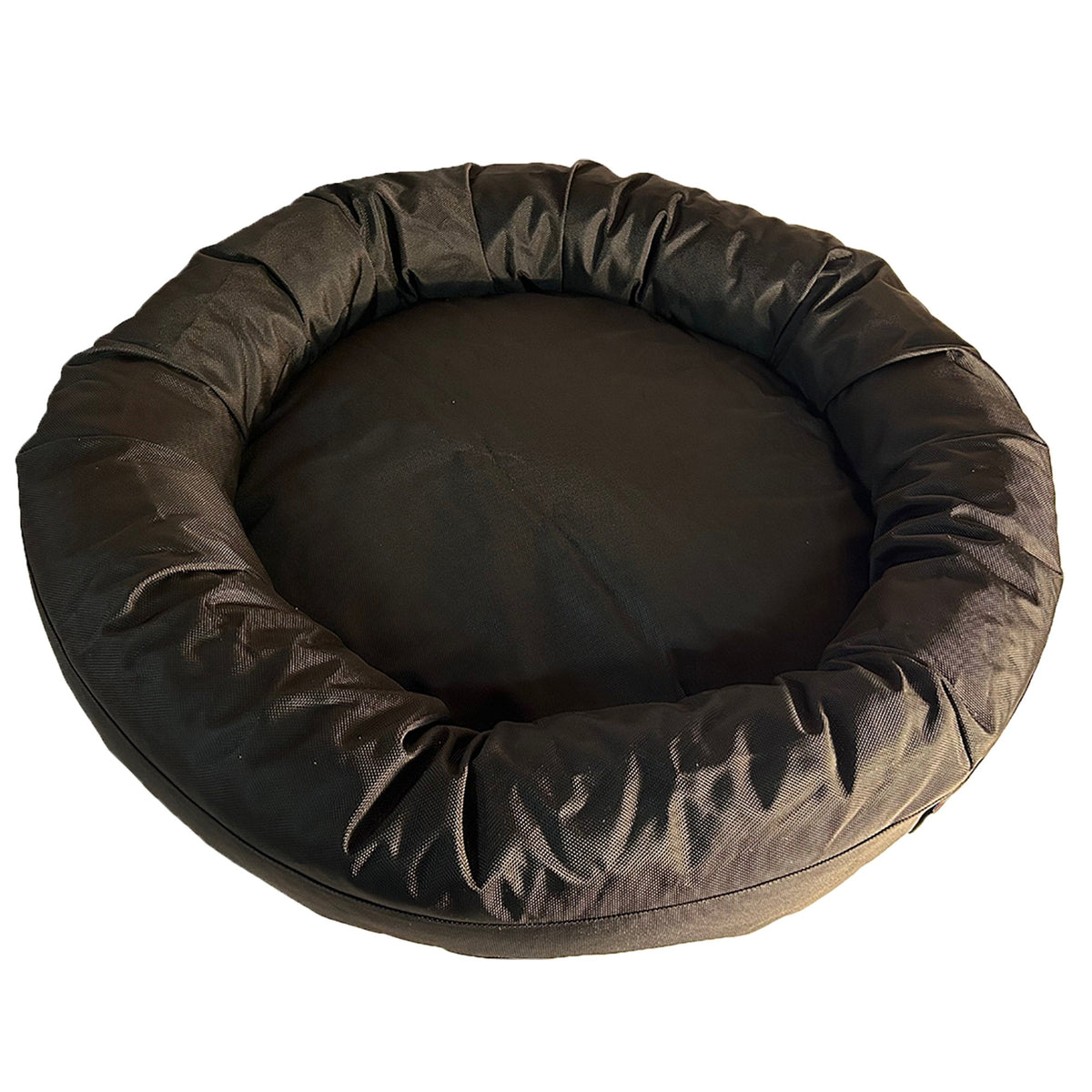 Armor bolster bed with calming nest-like walls