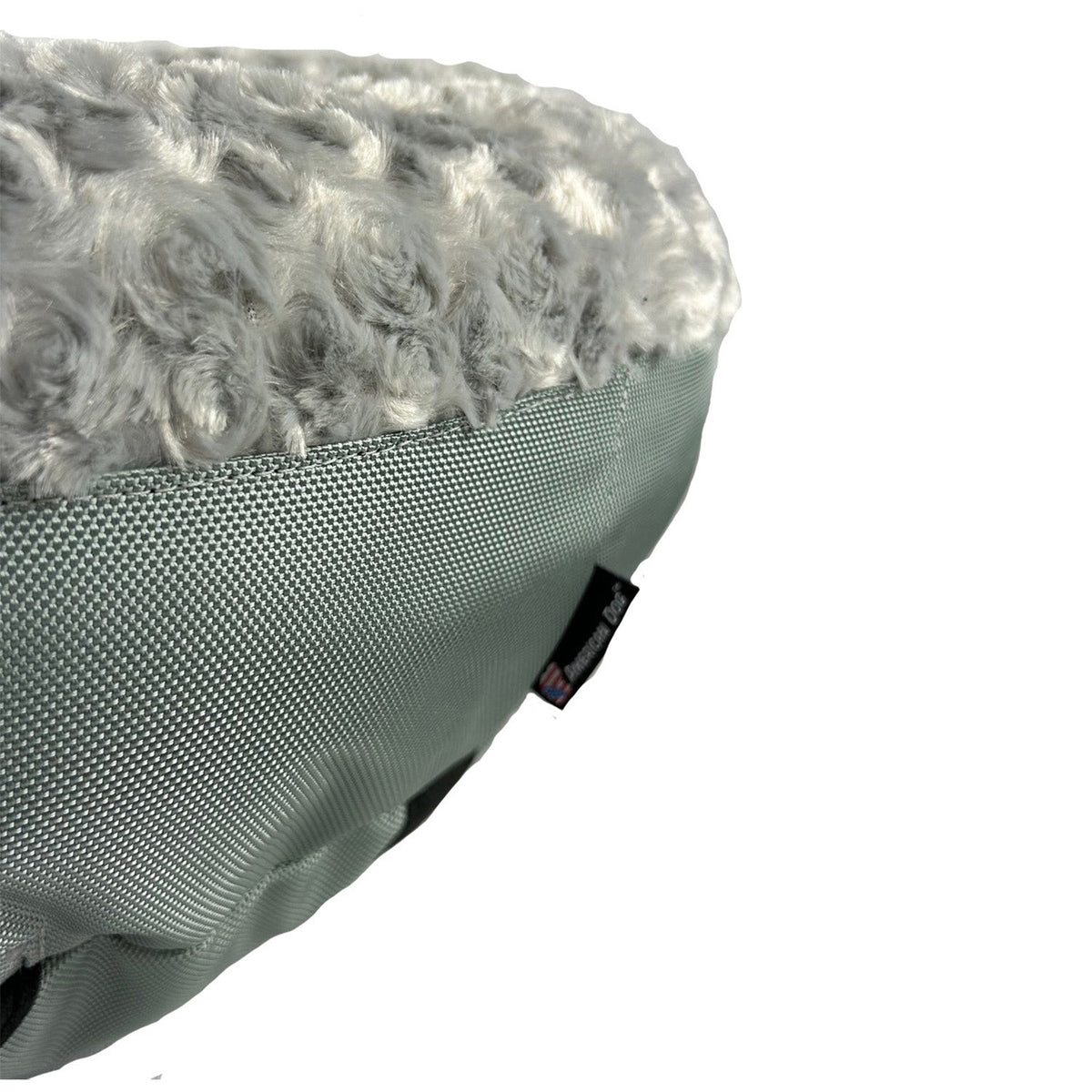 Round nest dog bed with calming bolster walls