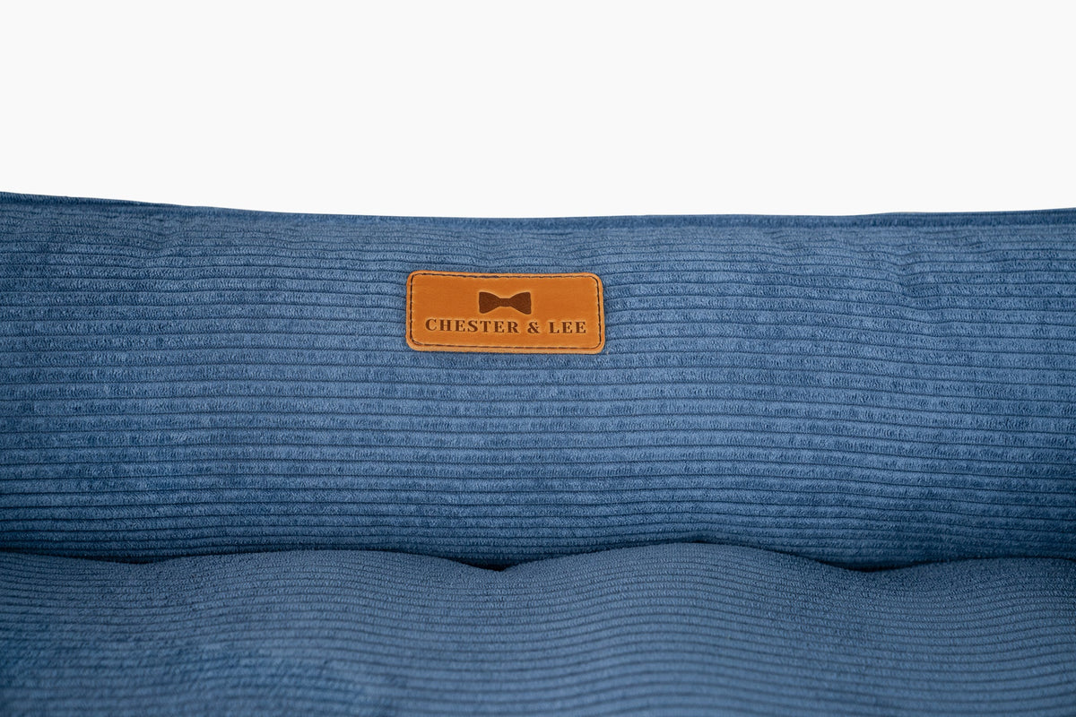 Chester and Lee fancy corduroy sleeper dog bed in calm blue