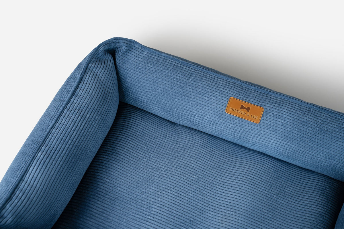 Spacious corduroy dog bed with washable removable cover