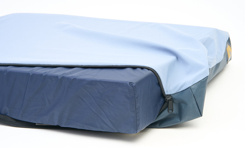 Portable HEST dog bed sized for kennels and crates